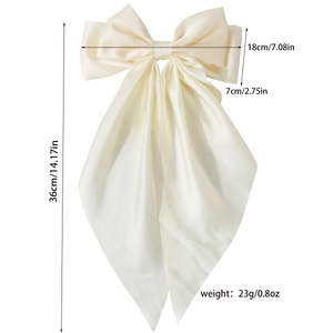 Elegant cream satin oversized bow hair clip with long ribbons and size dimensions