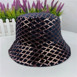 Black velvet bucket hat featuring rose gold sequin grid pattern and chic geometric design