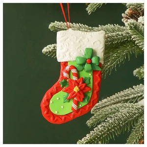 Close-up of a 3D resin Christmas stocking ornament with candy cane and bow detail