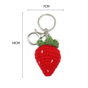 Handmade red crochet strawberry keychain with silver metal ring and size markings