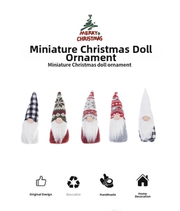 Detailed view of five Christmas gnomes with knitted snowflake hats and plush white beards