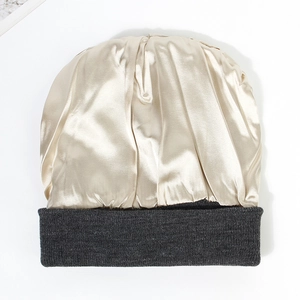 Champagne satin thermal sleep cap with dark grey knit trim and smooth texture