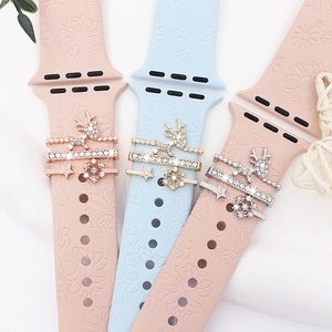 Silicone smartwatch bands with floral relief patterns and Christmas charms featuring elk and stars