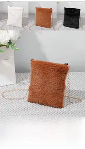 Detailed view of plush faux fur mini crossbody bags with elegant gold chain straps