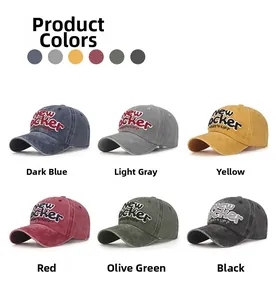 Detailed grid view of vintage washed cotton baseball caps with textured embroidery