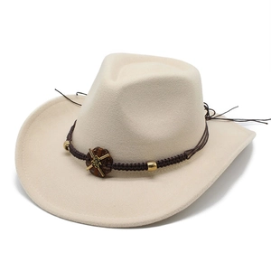 Detail of beige felt cowboy hat featuring braided rope and floral ornament