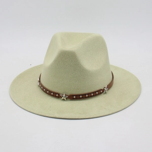 Detail of tan felt hat with brown leather band featuring silver stars and metal rivets