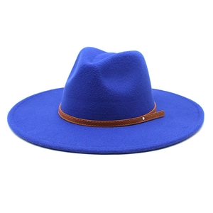Detail of royal blue wool fedora hat with brown leather band and silver metal buckle