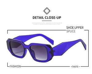 Detail of square blue geometric sunglasses with thick frames and gradient purple lenses