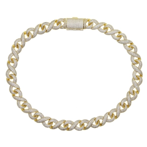Close-up of golden iced out Cuban chain necklace with sparkling zircon paved buckle detail