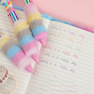Rainbow plush unicorn multi-color ballpoint pen with six ink colors on pink background