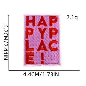 Detail of Happy Place embroidered patch showing 6.2x4.4 cm dimensions on white background