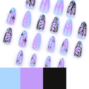 Short almond press-on nails with blue-purple gradient, butterfly and star patterns