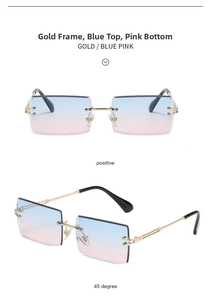 Detail of rimless rectangle sunglasses with blue-pink gradient lenses and gold metal frame