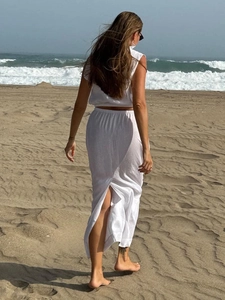 White sleeveless crop top and high waist slit long skirt beach set for women