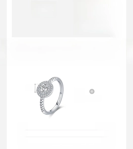 Detail of S925 sterling silver ring featuring a halo setting and crystal accents