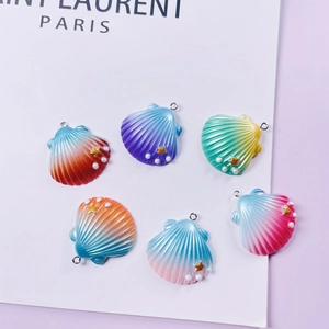 Colorful gradient resin shell charms with starfish and pearl accents for DIY jewelry