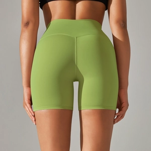 Rear view detail of high-waist avocado green yoga shorts with soft brushed fabric