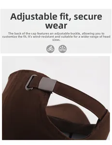 Detail of adjustable metal buckle and breathable cotton fabric on the dark brown baseball cap