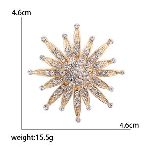 Elegant gold sunflower brooch with clear rhinestones including size and weight measurements