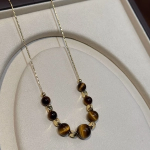 Tiger eye beaded necklace with 18K gold plated chain and gradient stone design