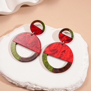 Retro geometric resin hoop earrings with red and green cloud patterns and artistic styling