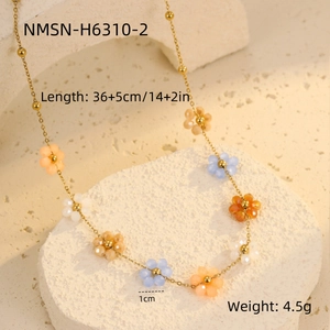 Detailed specs of floral gold necklace showing length, weight and flower diameter