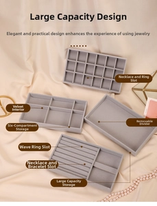 Detailed set of four grey velvet jewelry organizer trays for rings and necklaces