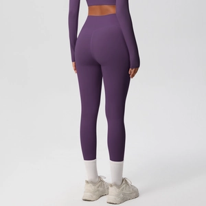 Close-up of high-waisted purple yoga pants featuring seamless shaping and push-up effect