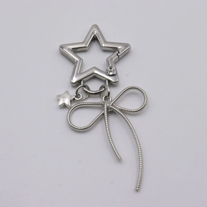 Silver star-shaped keychain with star charm and chic snake chain tassel for handbags