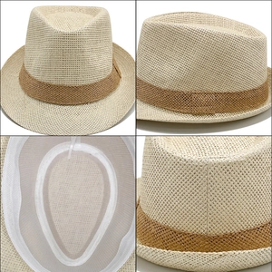 Classic British fedora straw hat in beige with brown decorative band for beach sun protection