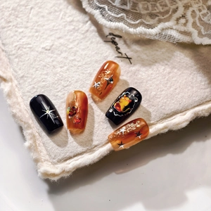 5-piece handmade medium-long square press-on nails with black amber and gold foil design