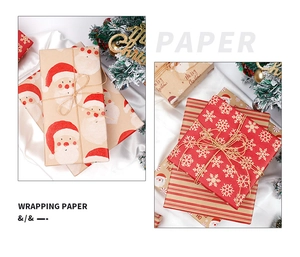 Détail du papier cadeau kraft avec motifs de Père Noël et flocons sur tissu en soie