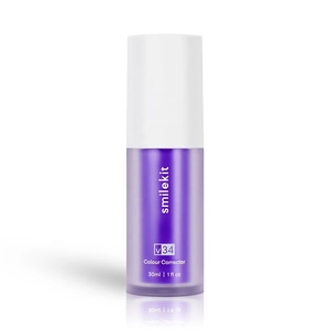 Smilekit V34 color corrector serum for teeth whitening in 30ml purple pump bottle
