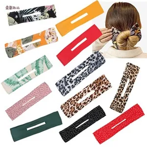 Various Halloween patterns deft bun hair bands showing floral, leopard and dot prints