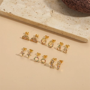 Golden stud earrings set featuring colorful rhinestones in star and moon shapes