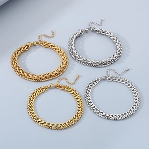 Double layer gold and silver link chain anklets with lobster clasp on grey background