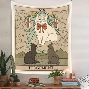 Macro detail of Bohemian cat tarot tapestry showing Judgement card design on a texture wall