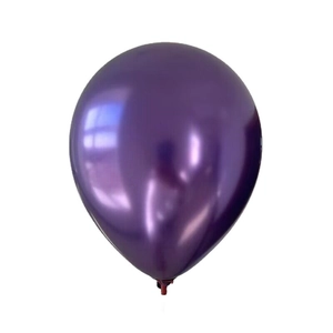 Macro view of purple metallic balloon with chrome texture and red inflation knot