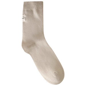 Mid-calf cream ribbed cotton socks with minimalist woven tag for casual daily wear