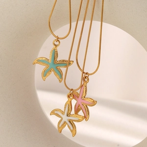 Set of three starfish pendant necklaces in blue, pink and white with 18K gold plated finish