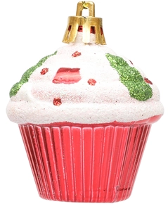 Macro shot of cupcake-shaped Christmas ornament with red base and creamy white glitter top