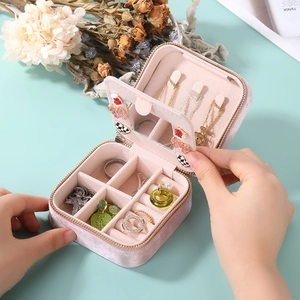 Portable pink velvet jewelry organizer box with double-layer zipper and internal mirror