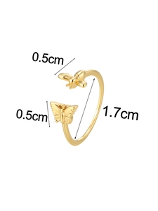 Detailed view of the butterfly and bee ring with size measurements for width and diameter