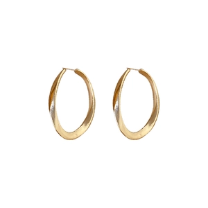Polished gold twisted oval hoop earrings in a minimalist and modern metal style
