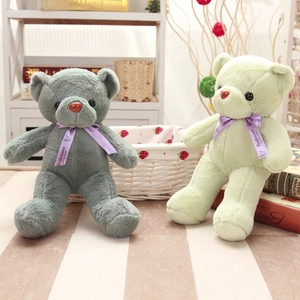 Pareja de ositos de peluche gris y verde menta con cintas de lavanda moradas