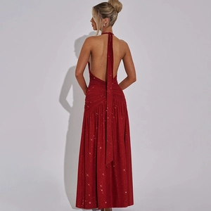 Rear view detail of a sparkling red backless halter maxi dress with long ribbon ties