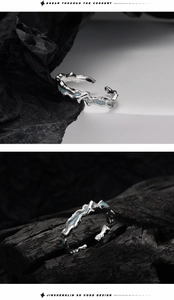 Detailed view of adjustable S925 silver ring with mint blue enamel and lava texture