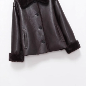 Women's faux shearling jacket in dark brown with leather texture and fur collar details