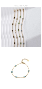 Detail of gold-plated stainless steel chain bracelets with colorful square zircons